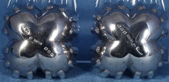 A pair of Victorian silver sweetmeat moulds,